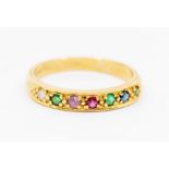 A 18ct gold DEAREST ring, comprising  a row of grain set round cut stones to include diamond,