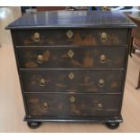 A Chinoiserie style lacquered four-drawer chest of recent manufacture on bun feet