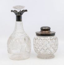 A Georgian style silver mounted cut glass decanter, mushroom stopper, with silver tricorn collar,
