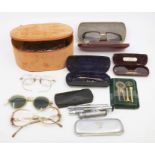 A collection of early 20th century plated vintage spectacles, pince nez and Victorian  lorgnettes,