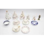 A collection of Royal Crown Derby china tea wares, as well as three Royal Doulton lady figures and a