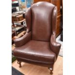 1920s Queen Anne style wind back chair reupholstered in brown leather