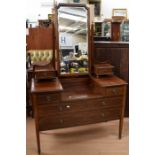Two Edwardian mahogany dressing tables with mirrors, both on castors
