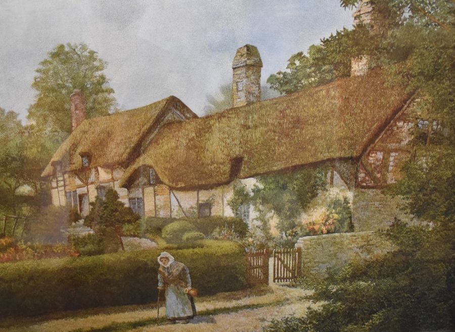 A large framed print of Anne Hathaway's Cottage