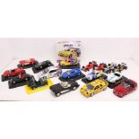 Diecast: A collection of seventeen assorted diecast Burago models. Most appear in good condition,