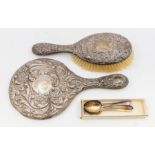A 1908 Birmingham dressing table mirror and brush, a set of six 1913 silver London teaspoons, approx