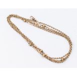 A Victorian 9ct gold guard chain with alternate chain, faceted lozenge and textured bead links,
