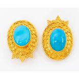 A pair of high carat gold turquoise type enamel earrings, comprising a central oval cabochon