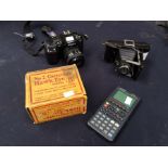 Nikon Automatic camera, Box camera, Pull-out camera and calculator