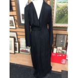 A Chanel dress, in black silk, size 12, longer length; figured silk, tie belt, small padded
