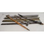 Painted tribal sticks, with two tribal wooden handle knives, rusty blades