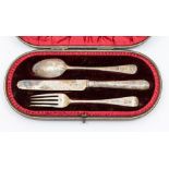 A late Victorian Christening set, engraved decoration to knife, spoon and fork, hallmarked by Robert