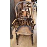 A 19th Century splat back Windsor chair with turned legs and supports