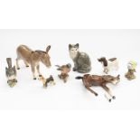 Collection of Beswick animals: donkey, horse, dogs, cats and birds