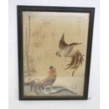 1920's Chinese silk frame depicting silk work of two fighting cocks. Artist signature to top