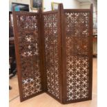 A modern hardwood three-panel room-divider/ screen, 1.9m high and 1.8m extended length