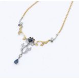 A sapphire and 18ct gold necklace, comprising a gold chain with alternate white and yellow gold