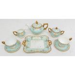 A Royal Crown Derby "Vine" pattern 6 piece tea service including cups, saucers, plates, teapot, milk