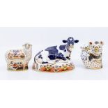 Three Royal Crown Derby paperweights to include: 1. Friesian Cow "Buttercup", silver stopper, signed