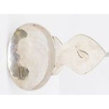 An Arts & Crafts plain silver large caddy spoon, hammered oval bowl with mitre shaped handle
