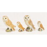 Two large and two small Beswick brown owls