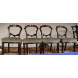 Four late Victorian balloon back mahogany dining chairs