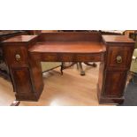 A Regency mahogany breakfront sideboard, central section with drawer flanked by pedestal supports