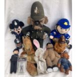 Collectables: A collection of assorted police related items to include: soft toys, wooden toy,