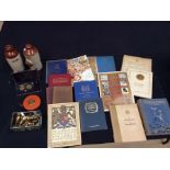 Collection of royalty books, two stone ware hot water bottles, cased scales, brass weights etc