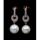A pair of cultured pearl and diamond set rose gold earrings, comprising a line and disc diamond