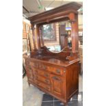 A late 19th/ early 20th Century large mirror-back mahogany sideboard with two drawers above three