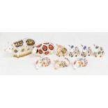 A collection of Royal Crown Derby pig paperweights to include: 1. limited edition visitor's centre