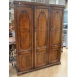 Late 19th Century mahogany three-door wardrobe with carved shell detail, along with a 1920s mahogany