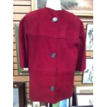 Claret suede jacket, size 14; early 1960's, slit at each side, collarless, stitching detail, back
