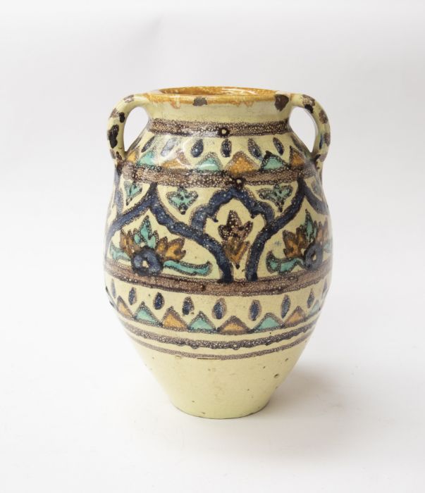 An Islamic pottery vase, height 19cm, chips to rim