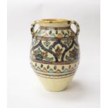 An Islamic pottery vase, height 19cm, chips to rim