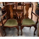 A pair of reproduction Queen Anne armchairs with walnut effect coating and padded seats (significant