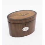 George III oval mahogany tea caddy with shell inlay detail to the lid and a silver plaque with
