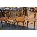 Four early 20th century Bentwood chairs, one with turned body