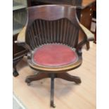 A 20th Century swivel Captain's chair