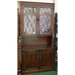 Large Old Charm style dresser, having two upper glazed doors and plate rack above four drawers