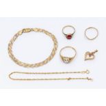 A collection of items to include a 9ct gold cz ring, size T1/2, a along with 9ct gold wishbone