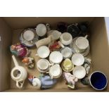 A collection of mixed china including Wedgwood, Clarice Cliff, Nao, Lisa B Moorcroft, RCD, Royal
