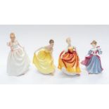 Four Royal Doulton figures of ladies - Gift of Love, Spring Song, Autumn Attraction, and Amy