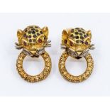 A pair of ruby and diamond set 18ct gold earrings in the form of a leopard  head, black enamel