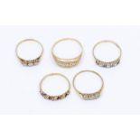 A collection of stone set 9ct gold rings to include a three stone quartz star set ring, size Y1/2,