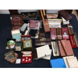 Collection of vintage boxed pens, wallets, purses, compacts and other items