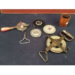A collection of mid 20th century measuring tapes and tools