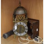 A lantern clock inscribed James Greene of Althorpe. A 30 hour rope driven verge movement striking on