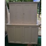 Two white-painted antique pine stationery cupboards - one floor fixing with internal shelves, the